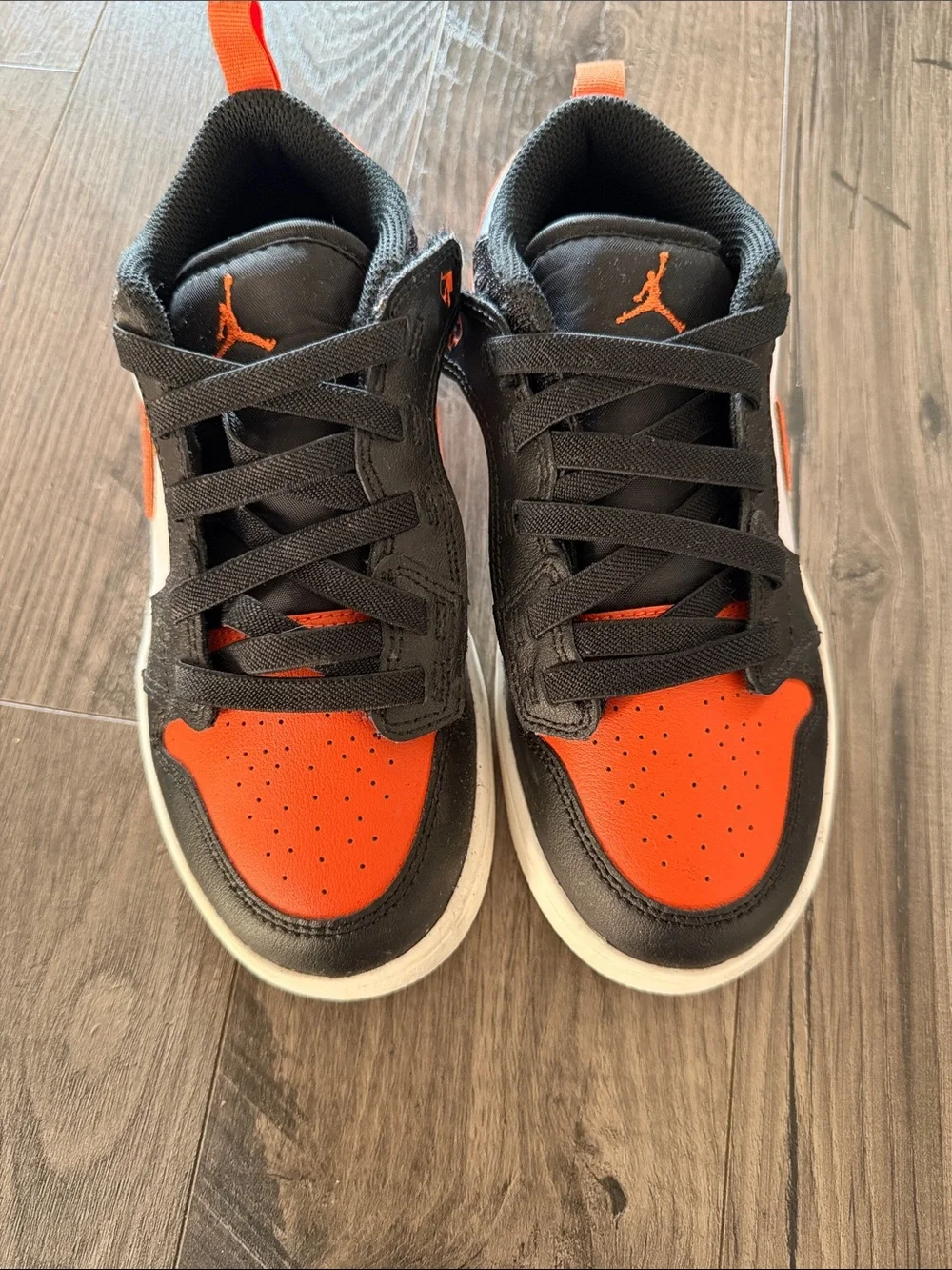 Jordan Kids Black and Orange Low Top Sneakers